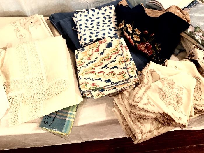 Close-up of some of the linens, textiles, antique to newer. 