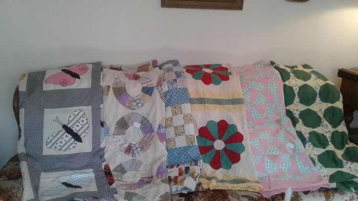 Dozens of quilt tops. Quilts, cutter quilts, bed spreads, linens