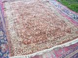 One of several old hand made rugs