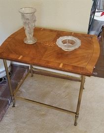 antique side table with book matched veneer and inlay design, metal legs