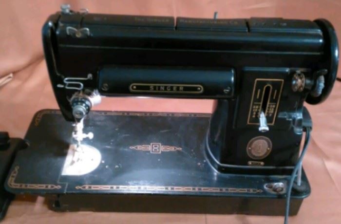 Vintage 1950's Singer Sewing Machine 301A. Needs minor repairs.