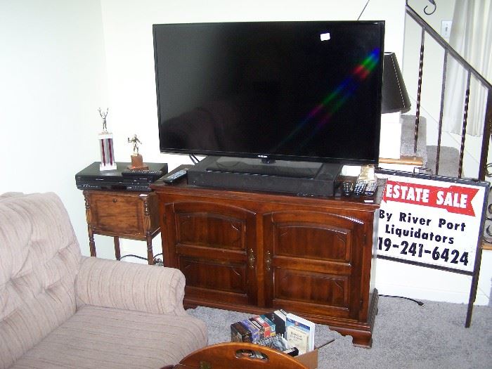 FLAT-SCREEN TV,  TWO-DOOR CABINET,  SMALL STAND & VCR