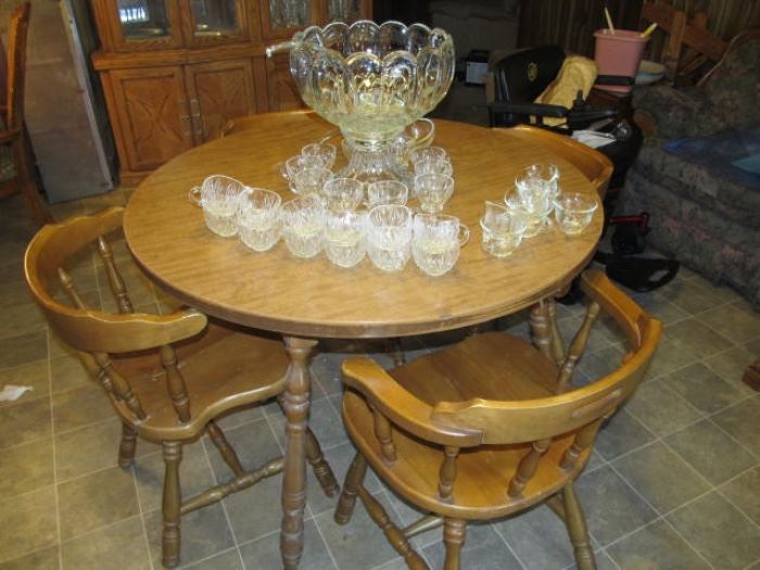round dining table and 4 maple chairs
