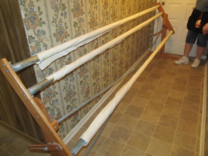 quilting frame, three 10' steel poles, with rackets on ends; tilts