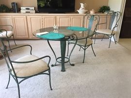 Matching the bakers rack, glass table and chairs