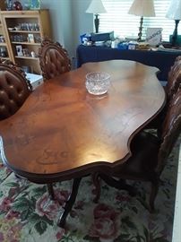 French Inlay Dining Room Table w/carved pedestal base with 4 wood carved chairs originally came out of a California Mansion cost was 3,800.00 our price is thousands less. Must see to appreciate the beauty of this fine furniture