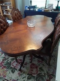 French Inlay Dining Room Table w/carved pedestal base with 4 wood carved chairs originally came out of a California Mansion cost was 3,800.00 our price is thousands less. Must see to appreciate the beauty of this fine furniture