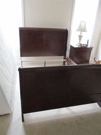 Cherry sleigh bed frame.  Full.  Original price:  $200.  Discount pricing applies both days.