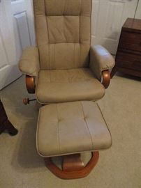 Leather swivel chair with matching Ottoman.  Adjustable. Original price: $300.  Discount pricing applies both days.