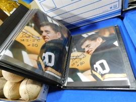 Binder of signed Packers photos