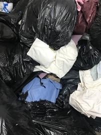 Tons of comforters, blankets, towels, linens,