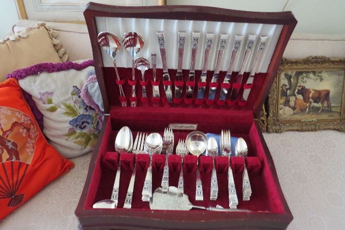 Full sets of plated silverware 