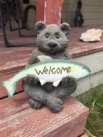 Bear/fish welcome statue