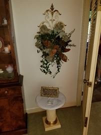 Pedestal and floral sconce