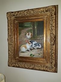 Bunny's in gold wooden frame.  They are so cute..