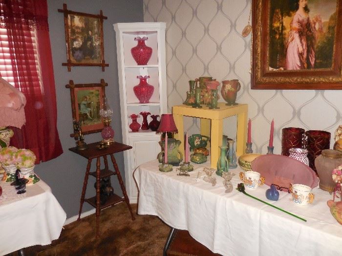 Antique table, prints, Fenton vases, and Roseville