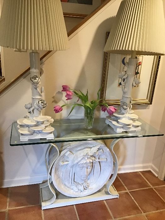 Art Nouveau style glass top console table with lady head in relief, pair of blanc de chine water lily motif lamps