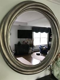 Large round silver gilt mirror