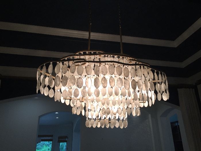 Beautiful Hanging Chandelier made of oval white cadiz shells