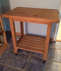 Storehouse butcher block island on casters