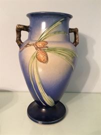 dramatic tall pottery vase (pine motif repeats on other side) 