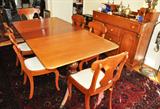 1940s DINING ROOM SET. LEWISBURG CHAIR AND FURNITURE COMPANY (LEWISBURG, PA). CHERRYWOOD. DINING ROOM TABLE (62" L X 40" W X 29" H), 6 CHAIRS, EXTRA TABLE LEAVES (3 AT 14" EACH), CHINA CABINET (36" W X 17" D BOTTOM AND 13" D AT TOP X 37" H) AND BUFFET (50" W X 20" D).