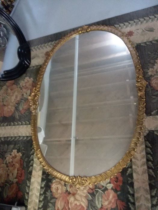 large gold gilded mirror