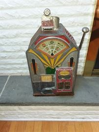 Antique, working slot machine