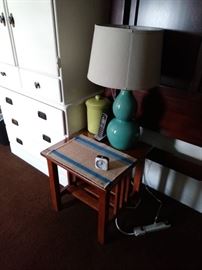 Mission style end table and turquoise lamp. 