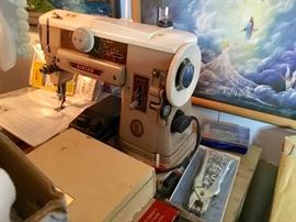 One singer above and another cabinet machine