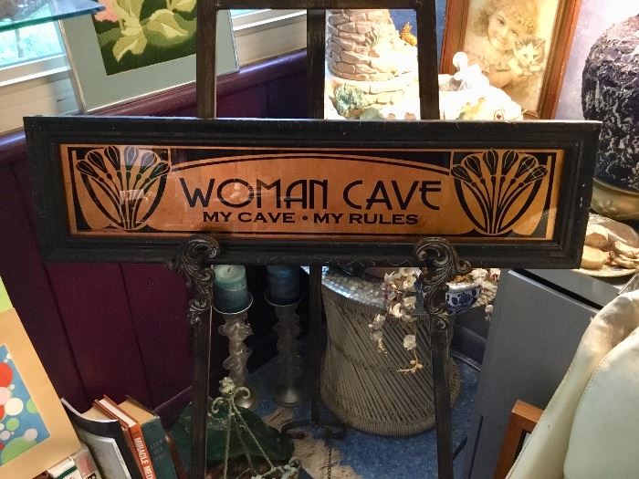 Woman cave sign
