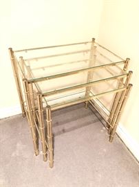 Set of 3 glass stackable tables with gold trim 