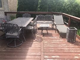 Patio Furniture. Rod Iron Set includes Rectangle Table, 4 Side Chairs with cushions, 2 Arm Swivel Chairs with cushions, bench with cushion, end table, lawn chair, & waste basket. 