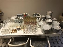 Dishes, bowls, glasses, table, 6 dining chairs 