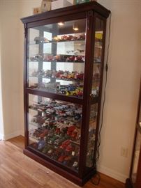 Large Display Cabinet, front glass Panel slides either way