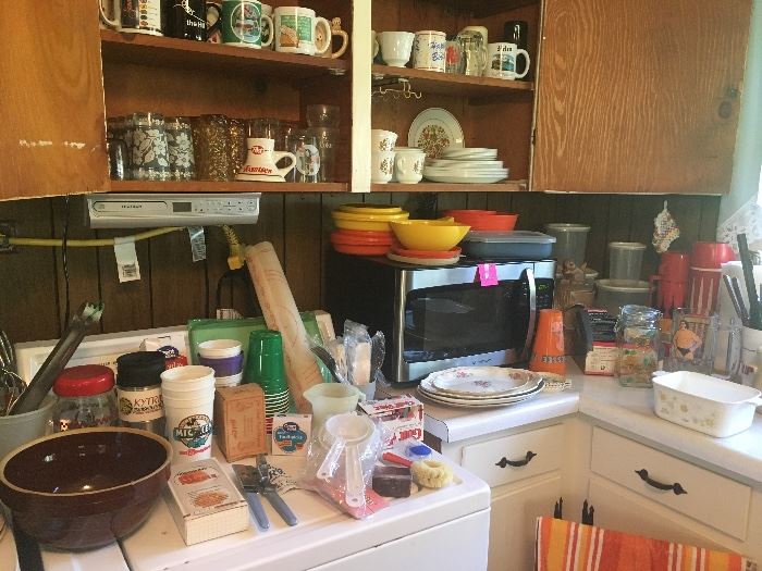 microwave, miscellaneous glassware, kitchen utensils