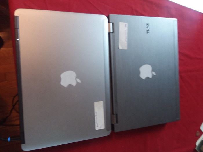Working, tested laptops....note...these are NOT apples...owner put stickers on them as a gag. 