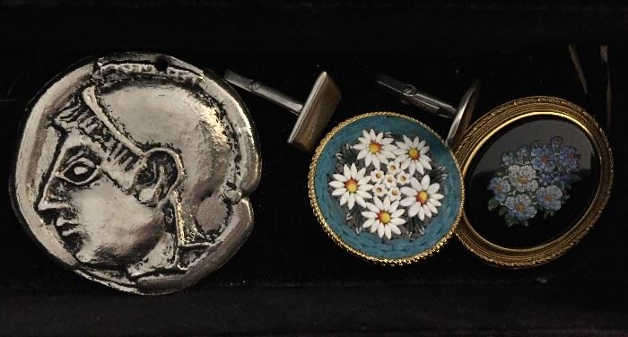 Cufflinks and other jewelry.