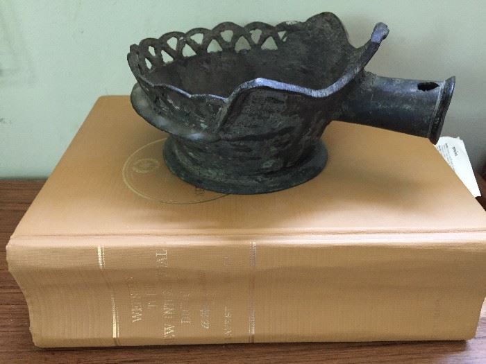 Dictionary and carved bowl.