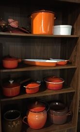 Le Creuset and other orange bakeware.