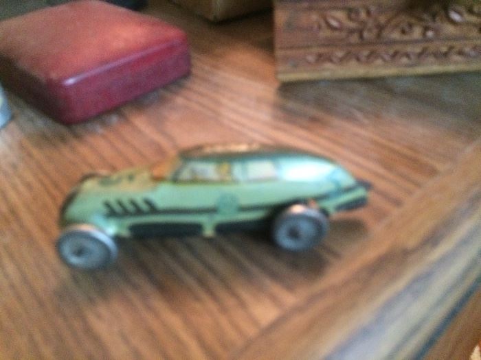         
           (Cool circa 1930s comet wind up car)