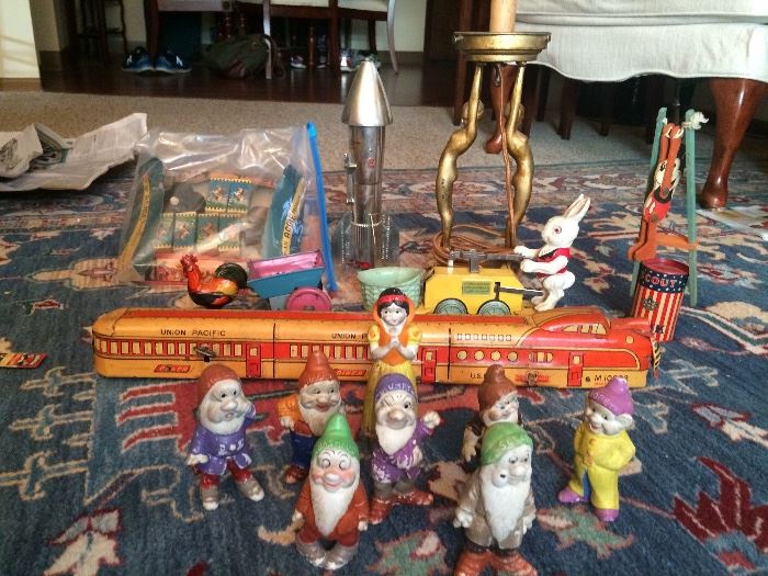 More vintage toys including super Lionel PETEr RABBIT CHICK mobile and Walt Disneys eight piece Snow White and seven dwarfs bisque figure set ect.