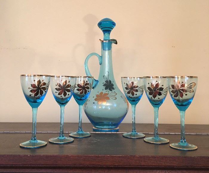 Blue Glass Wine Bottle/Glasses   http://www.ctonlineauctions.com/detail.asp?id=717747