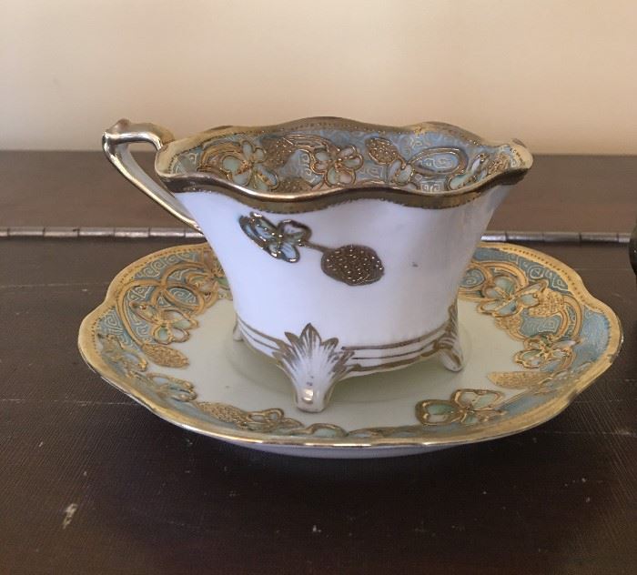 Fine Porcelain Tea Cups   http://www.ctonlineauctions.com/detail.asp?id=717758