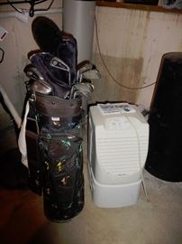 golf clubs / dehumidifier 