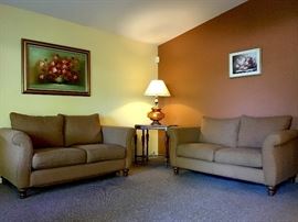2 matching love seats