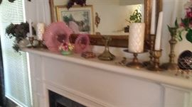two pink Fenton bowls with candles and ruby to clear etched egg on stand.  