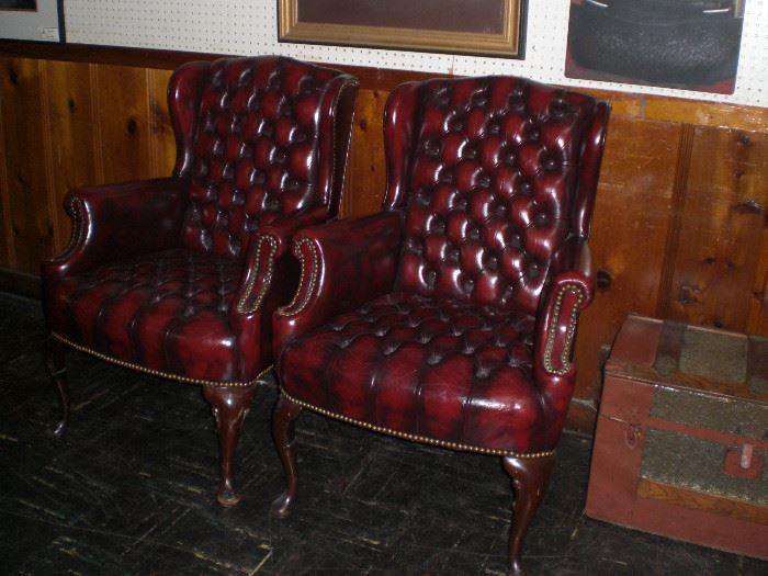 pair Hancock & Moore button tufted leather wing back chairs