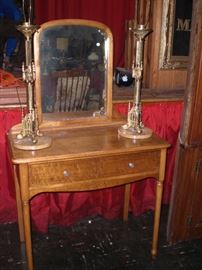 pair of ornate Gothic gilt bronze candlesticks as lamps with marble bases and birds eye maple dressing table with mirror
