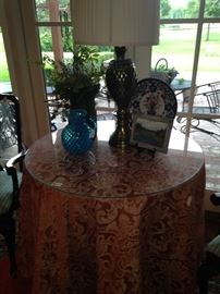 The custom-made table skirt & glass top make a beautiful table.